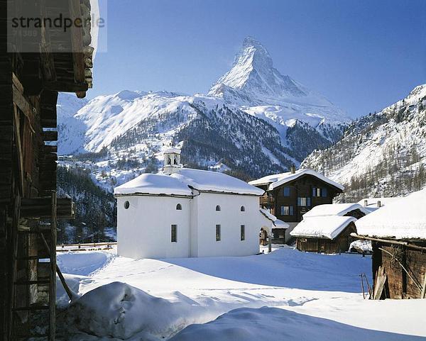 10056051  Bergpanorama  Alpen  Bergen  Landhäuser  Kapelle  Matterhorn  Sehenswürdigkeit  Berg  Schweiz  Europa  Wallis  co
