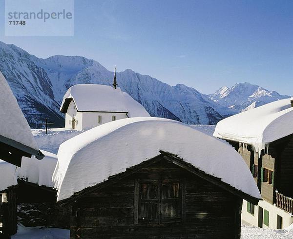 Landschaftlich schön landschaftlich reizvoll Europa Berg Winter Wohnhaus Gebäude Tal Kirche Bettmeralp Schweiz