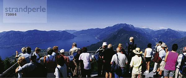 10578556  anzeigen  Person  Terrasse  Terrasse  Cardada  Lago Maggiore  See  Meer  Luzern  keine Modellfreigabe  Panorama  Schweiz