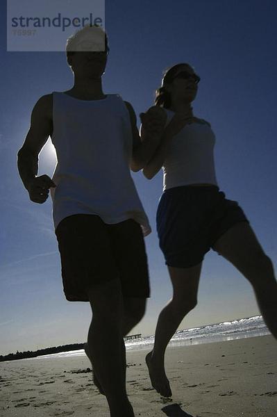 10642293  Aktion  dunkel  Fitness  Gegenlicht  laufen  Joggen  sport  Meer  Natur  Paar  Paar  Sport  Strand  Meer