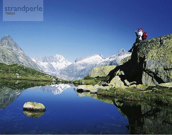 Felsbrocken Landschaftlich schön landschaftlich reizvoll Berg Steilküste Feld Alpen Berner Oberland Kanton Bern Bergsee