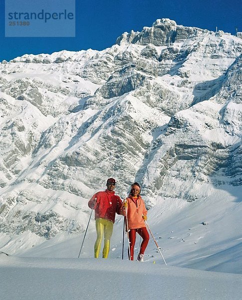 10185853  background Santis  Langlauf  Leggings  paar Paar  Poppig  Stand  Winter  Winter  Sport  Sport Cross