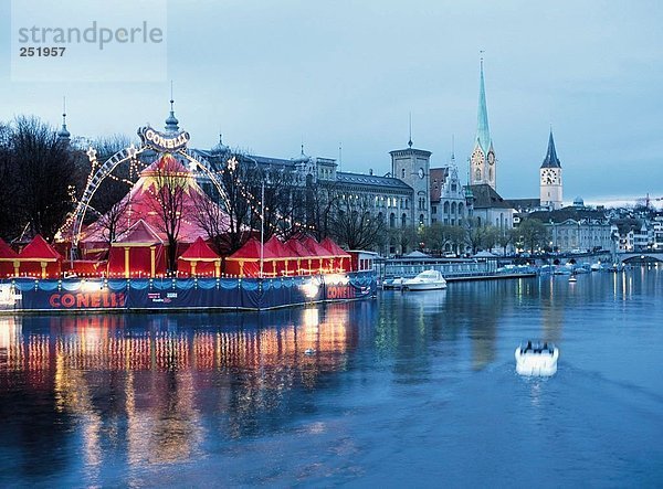 Europa Stadt fließen Fluss Kirche Weihnachten Abenddämmerung Schweiz Dämmerung Kanton Zürich