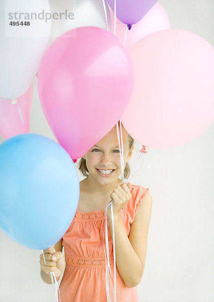 Mädchen mit Luftballons