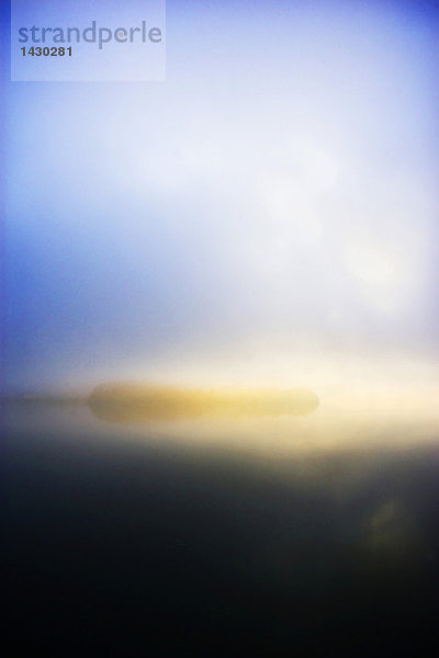 Austria  Salzkammergut  fog over lake Mondsee