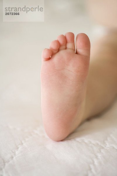 Nackte Fußsohle eines Babys