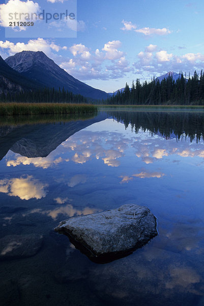 Reflection of a mountain in a lake enroute to the historic Athabasca pass in Jasper National Park