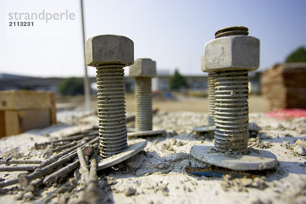 'Nut  bolt  and washers embedded in concrete