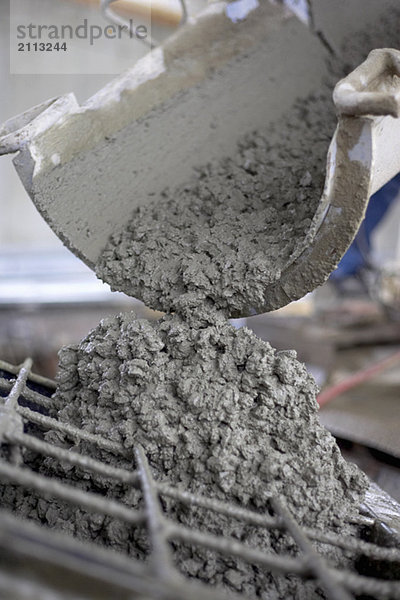 'Cement pouring out of mixer