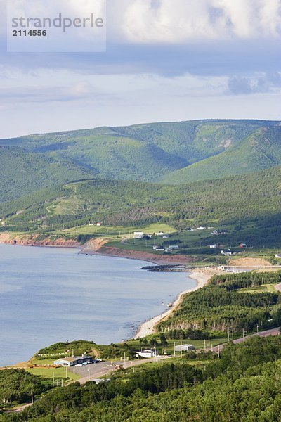 View of village and Gulf of St. Lawrence  Cape Breton Highlands National Park  Nova Scotia  Canada