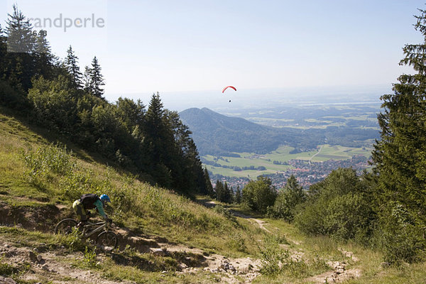 Germany  Bavaria  Kampenwand  Aschau  mountainbiker on the way