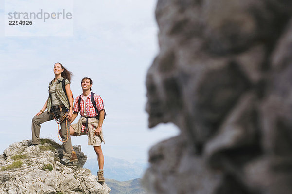 Austria  Salzburger Land  couple on mountain top