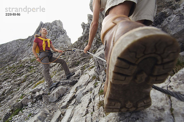 Austria  Salzburger Land  couple mountain climbing