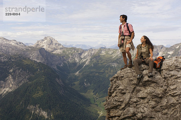 Austria  Salzburger Land  couple on mountain top