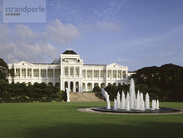 Der Istana (Präsidentenpalast)  Singapurianer/in
