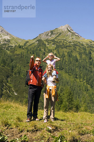 Austria  Salzburger Land  couple with daughter (6-7)