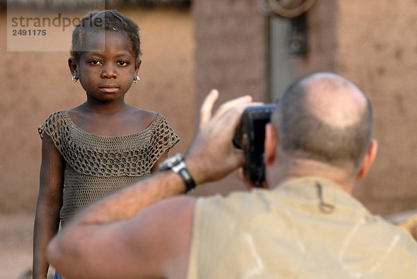 Afrika  Burkina Faso  Fotograf Aufnahme boy