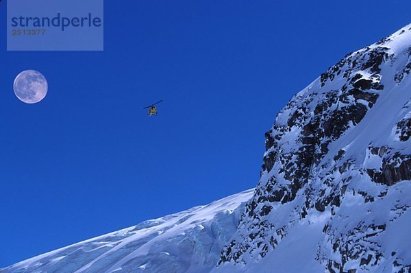 Helicopter In Mountains  Whistler  BC  Canada