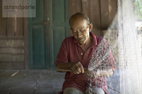 Menschen die einen Fisch Net  Laos