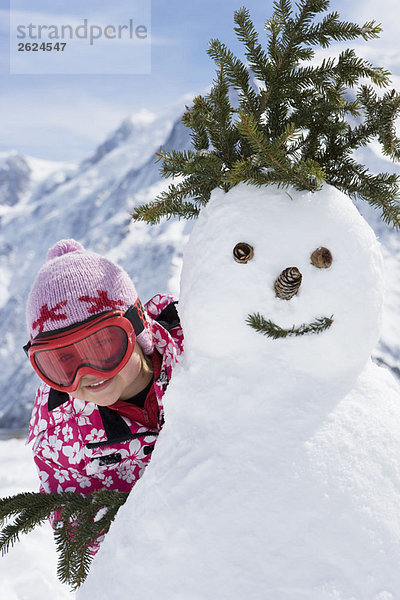 Mädchen mit Schneemann