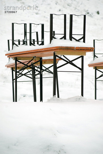 Germany  Allgaeu  Snow-covered table and cars