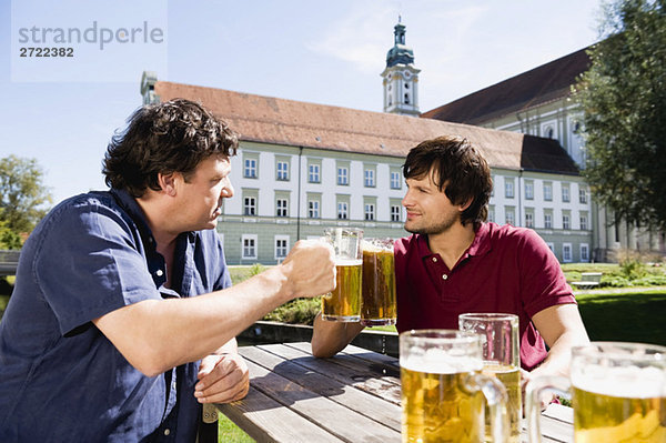 Upper   Two men in beer garden