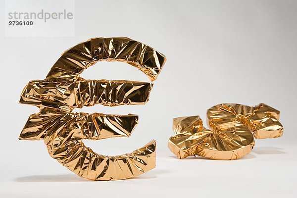 Gold Euro und Dollarzeichen
