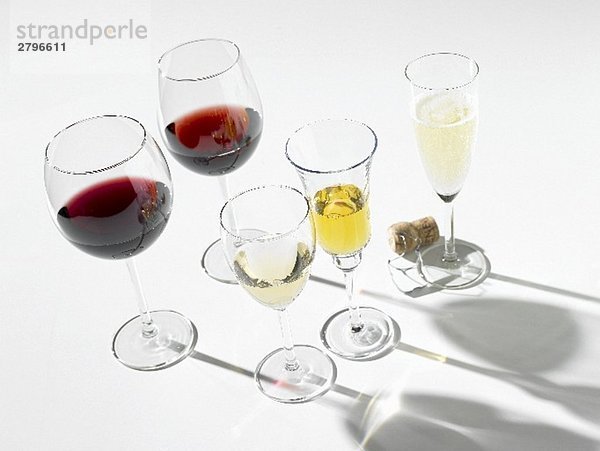 Various wines in glasses  one glass of sparkling wine