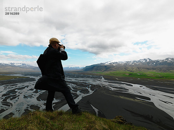 Ein Fotograf Aufnahmen Island.
