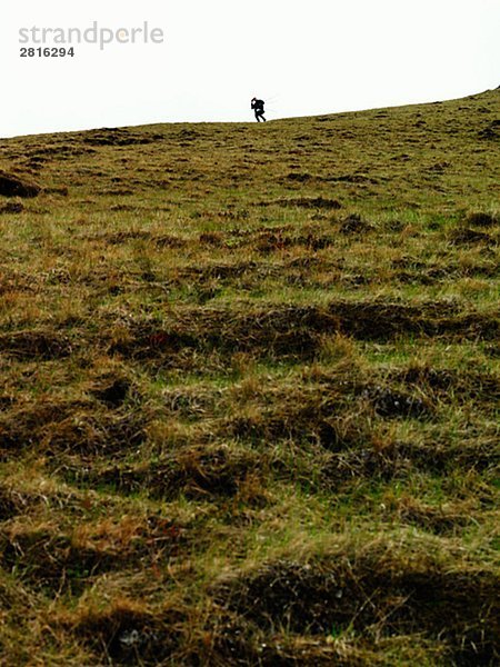 Ein Mann auf einem Berg Island.
