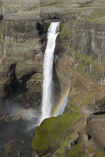 Iceland  Waterfall and rainbow