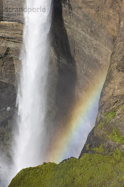 Iceland  Waterfall and rainbow