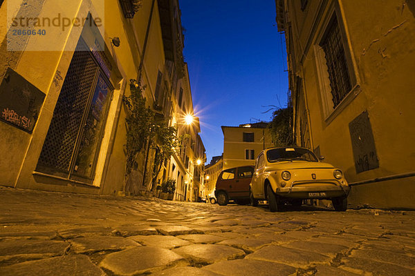 Italy  Rome  Trastevere  Lane with parking cars