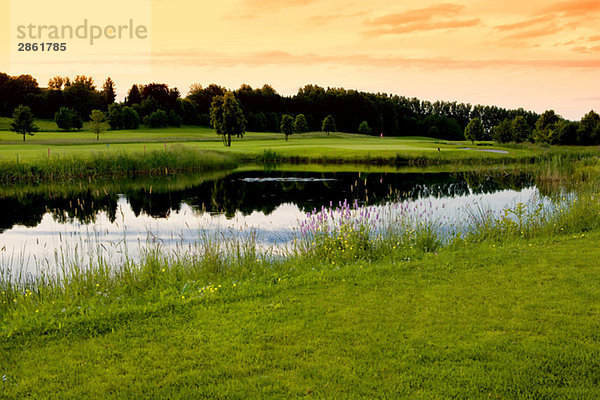 Germany  Bavaria  Golf course with lake