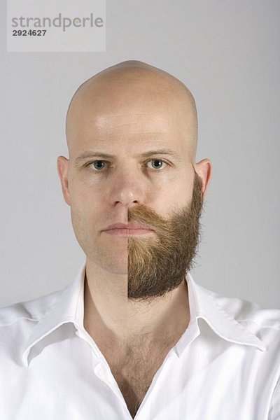 Ein Mann mit einem halb rasierten Bart und Schnurrbart.