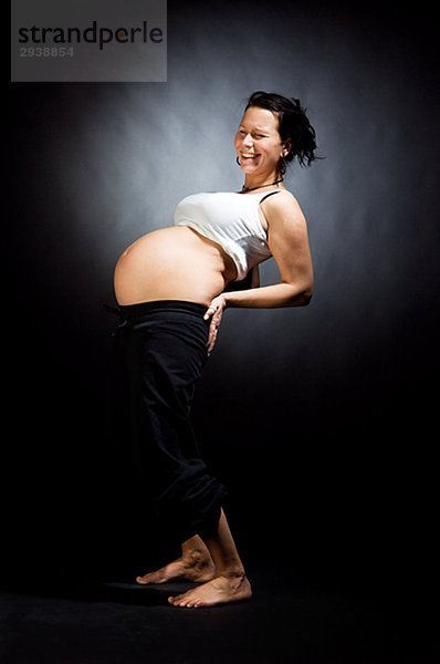 Eine schwangere Frau.