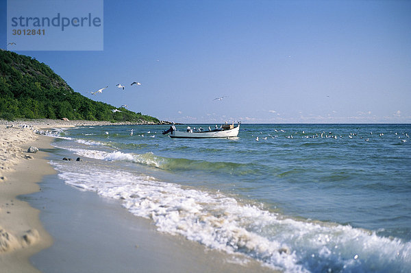 Boot ankern am Strand