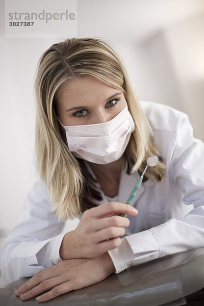 Germany  Bavaria  Landsberg  Female Dental assistant wearing mask