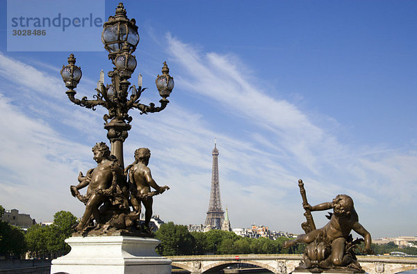 France  Paris  Pont Alexandre III  Bronze statues  Eiffel Tower in background