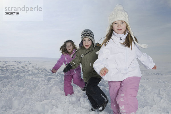 Germany  Bavaria  Munich  Children in snowy landscape