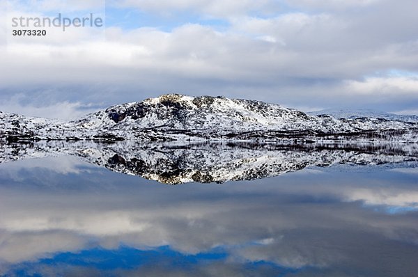 Sea as bright as a mirror Vassijaure Lapland Sweden.