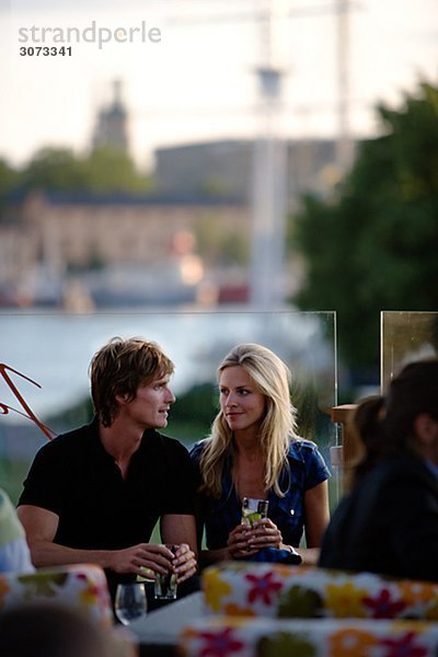 A couple at a bar Stockholm Sweden.