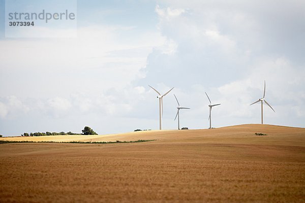 Wind turbines in a field Skane Sweden.