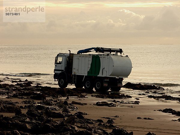 A refuse lorry on a beach the Canary Islands.