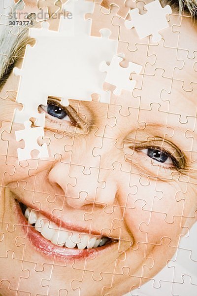 A puzzle with the image of a woman.