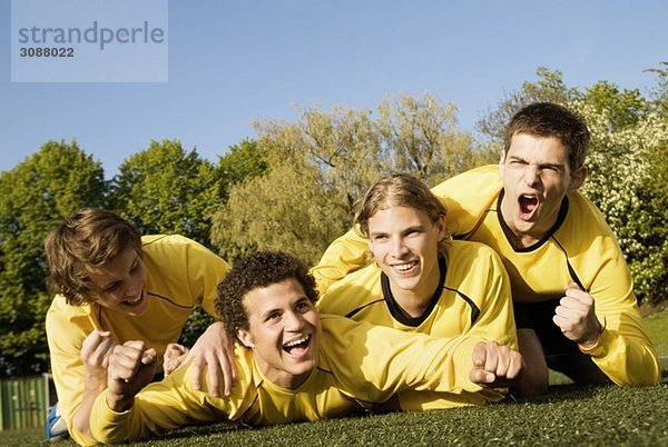 Glücklicher Fußballspieler