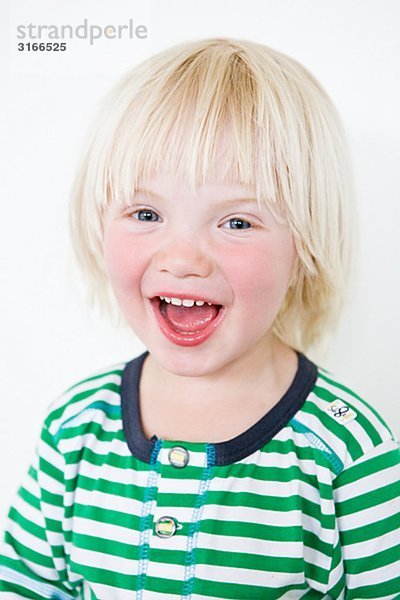 Portrait of a happy kleiner Junge  Schweden.
