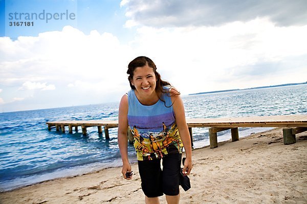 Portrait einer Frau an einem Strand  Dänemark.