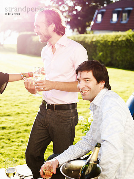 Friends in a garden  Sweden.