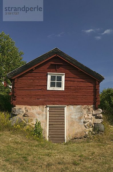 A red cottage  Sweden.